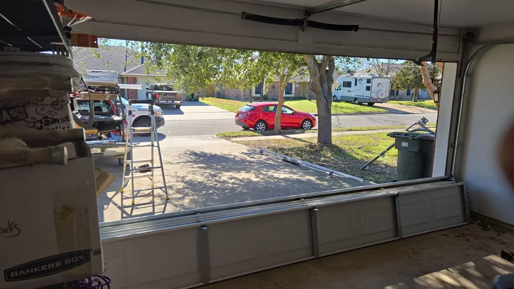 New garage door installation in progress