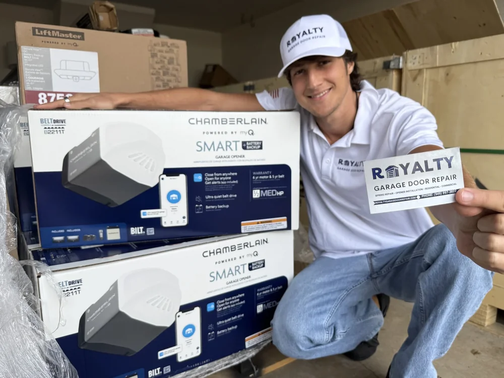 Royalty technician with new Chamberlain garage door openers